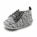 Breathable black and white knit baby walking shoe with a soft non-slip rubber sole - Black and White Knitted (7054)