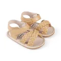 Detailed view of the soft braided straps and secure Velcro on beige baby pre-walker sandals. - Insole Length 11cm / Apricot