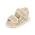 Breathable mesh baby walker sandals featuring dual hook-and-loop straps in elegant beige - Apricot