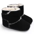 Detailed view of black suede baby winter boots featuring soft white faux fur lining - 11cm / Black