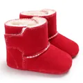 Close-up of red toddler soft sole boots with warm white faux fur lining - 11cm / Red