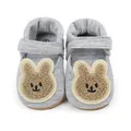 Close-up of grey baby walking shoes with cute cartoon bear patch and soft strap - 11cm / Cartoon Rabbit Style (1549) / Gray