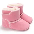 Close-up detail of pink suede infant boots with warm fleece lining and soft soles. - 11cm / Pink