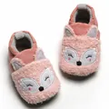 Detailed view of soft pink baby booties with cute embroidered fox face for winter warmth - Pink Fox