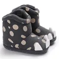 Detailed view of baby winter plush boots featuring cute 3D claw design and polka dots - Gray