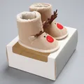 Close-up of reindeer pattern on knitted baby winter snow boots with warm fleece lining - Inner Length 11cm / Beige Knitted Christmas Reindeer (C-420)