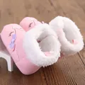 Detail shot of pink baby winter snow boots featuring cozy white faux fur lining - 11cm / Pink