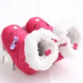 Close-up of pink infant snow boots with soft white faux fur lining and cute bow - 11cm / Peach Red