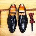 Hochwertige schwarze Herrenschuhe aus echtem Leder mit Brogue-Muster und Quastenverzierung - Schwarz