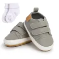 Grey toddler walking shoes featuring dual Velcro straps with a pair of white baby socks - 12cm / Shoes and Socks Set / Gray