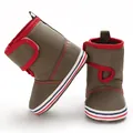 Side and front detail of baby soft-sole walking boots in olive green with red trim - Green