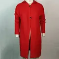 Close-up detail of women's red long-line hooded knit cardigan sweater on a mannequin - Red