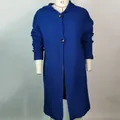 Elegant long royal blue knitted cardigan sweater coat for women displayed on mannequin - Blue