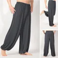 Pantalones de yoga sueltos para hombre en gris oscuro con cintura y puños elásticos - Gris oscuro