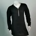 Close-up of black V-neck knitted sweater featuring a functional front zipper detail - Black