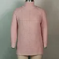 Detailed view of a pink knitted turtleneck sweater dress displayed on a mannequin. - S / Dresses / Pink