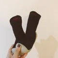Détail de chaussures chaussettes pour bébé doublées polaire noires et gris - Noir