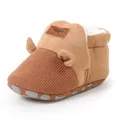 Nahaufnahme von braunen Bären-Babystiefeln mit weichem Fellfutter und rutschfester Sohle - Khaki