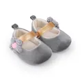 Detailed view of grey velvet baby girl princess shoes with gold strap and flower - 11cm / Gray