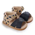 Side view of baby girl walking shoes with polka dot heels and cross straps - Dark Blue