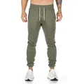 Front view of men's army green slim-fit cotton joggers for gym and running - M / Bottoms / Army Green