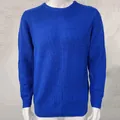 Close-up of a vibrant royal blue knitted pullover sweater for men on a white mannequin - Dark Blue