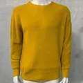 Close-up detail of a mustard yellow knitted men's crewneck pullover sweater texture - S / Tops / Yellow