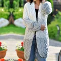 Close-up detail of oversized cable knit cardigan with white to grey gradient color - M / Tops / Gray