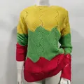 Detailed view showing the wave pattern color-block knit texture on rainbow sweater - S / Tops / Yellow Green Pink Color Block