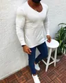 Casual men's slim fit white V-neck long sleeve knit sweater styled with blue jeans - S / Tops / White