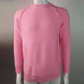 Elegant men's soft pink crew neck long sleeve knitted sweater displayed on a mannequin - Pink