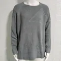 Close-up view of grey long-sleeved round neck knitted sweater with textured chest pattern - M / Tops / Gray