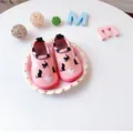Detail view of pink toddler slip-on shoes with cute cat pattern and star prints - Pink Kitten