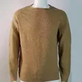 Detailed view of men's slim-fit crewneck sweater with textured chevron knit pattern - S / Tops / Camel