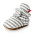 Detail view of striped knit baby bootie with warm plush lining and soft non-slip sole - 11cm / Light Grey Pattern