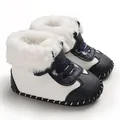 Detailed view of navy blue baby snow boots with thick white faux fur lining - Dark Blue