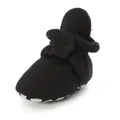 Close-up detail of black infant soft sole walker shoe with elasticated ankle support - 11cm / Black