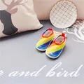 Toddler rainbow canvas slip-on walking shoes featuring a cute yellow smile face design - Rainbow Smile