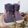 Detailed view of winter baby plush sock shoes with warm lining and soft rubber sole - Size 20/21 / 12.5cm / Purple