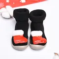 Detalle de zapatos calcetín de Navidad negros para bebé con decoración de peluche - Talla 20/21 / Bota de Navidad / Negro