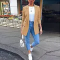 Front view of a chic camel mid-length double-breasted blazer for women in a street setting - S / Tops / Khaki