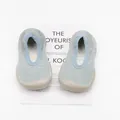 Top view of breathable blue children's sock shoes with soft rubber soles. - Blue With Gold Thread