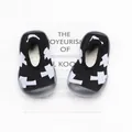 Breathable baby sock shoes with white cross pattern on black fabric, soft sole for toddlers. - Size 18/19 (Insole 11.5cm) / Black Cross