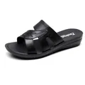 Classic black leather sandals for older women featuring soft non-slip flat wedge sole - 35 / Black