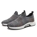 Grey breathable knitted slip-on sports shoes with orange accents and thick white sole - 37 / Gray