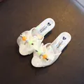 Elegant white girl's princess slippers featuring holographic insole and decorative bow - Off White