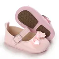 Close-up detail of pink patent leather baby Mary Jane shoes with bow and anti-slip sole - Inner Length 12cm / Pink