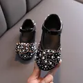 Black Mary Jane shoes for girls featuring elegant pearl and rhinestone embellishments. - 21 / Black