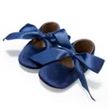 Navy blue velvet princess baby shoes with large satin ribbon bow and soft walking sole. - 11cm (0-6 Months) / Dark Blue