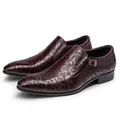 Men's burgundy formal leather shoes with embossed scroll pattern and buckle detail. - Burgundy